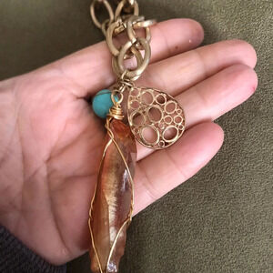 Gorgeous stone and charm necklace